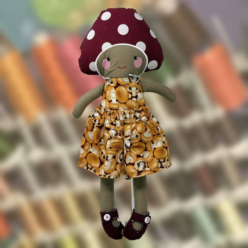 Madeline Mushroom Doll, with another mushroom cap, handmade by Fabri-K-Tions in Louisville, KY