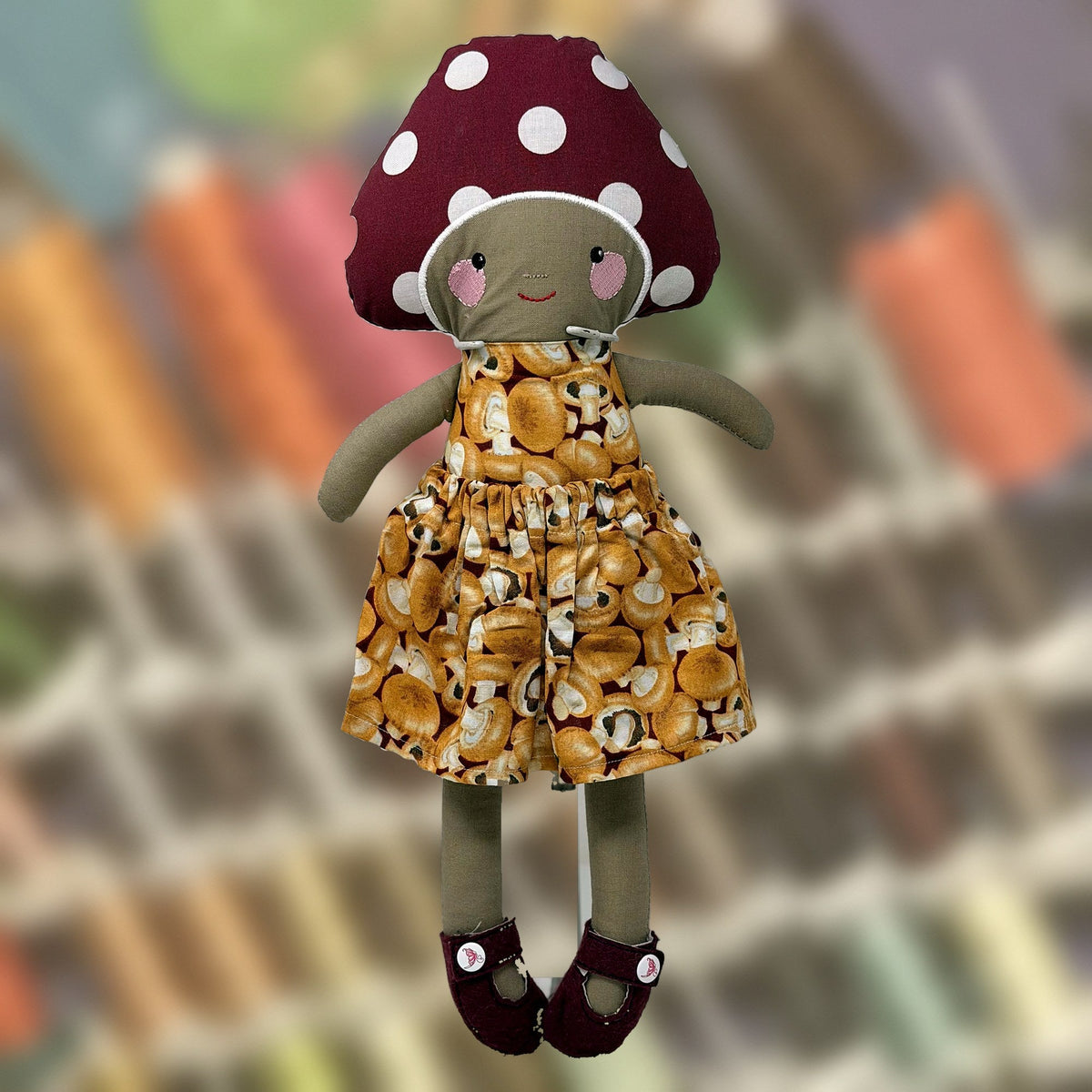 Madeline Mushroom Doll, with another mushroom cap, handmade by Fabri-K-Tions in Louisville, KY