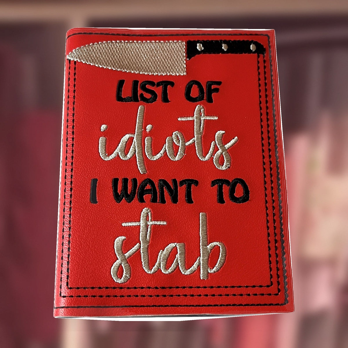 List of Idiots Notebook cover, an A6 notebook cover with notebook and pen, handmade in Louisville, KY