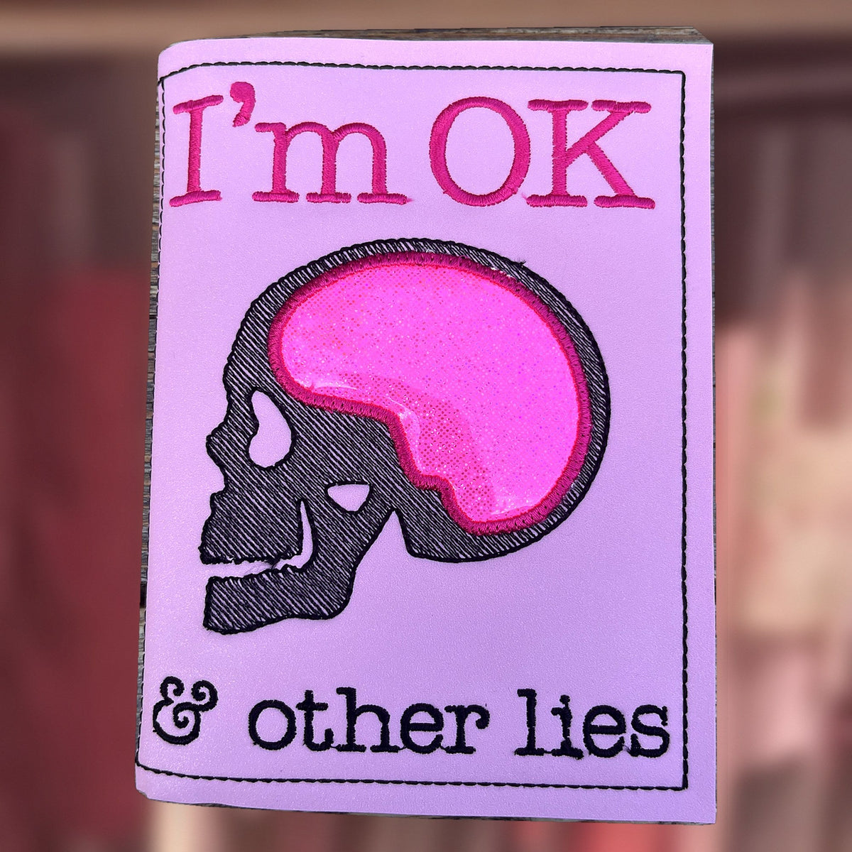 I'm OK & Other Lies Notebook cover, an A6 notebook cover with notebook and pen, handmade in Louisville, KY