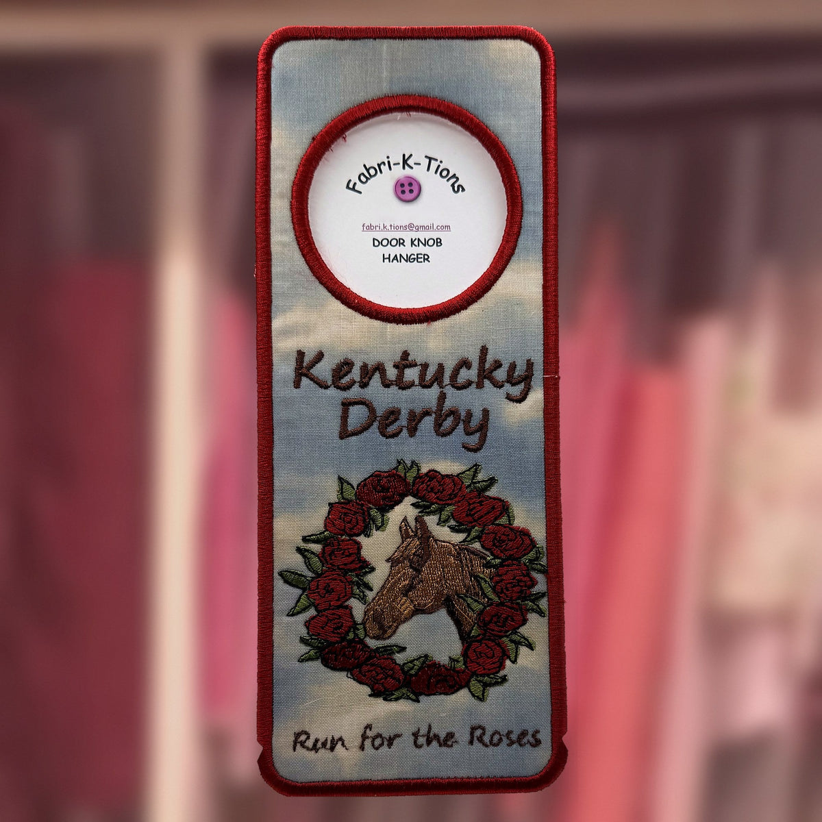 Derby Day Roses Door Knob Hanger, an embroidered fabric door hanger, handmade in Louisville, KY