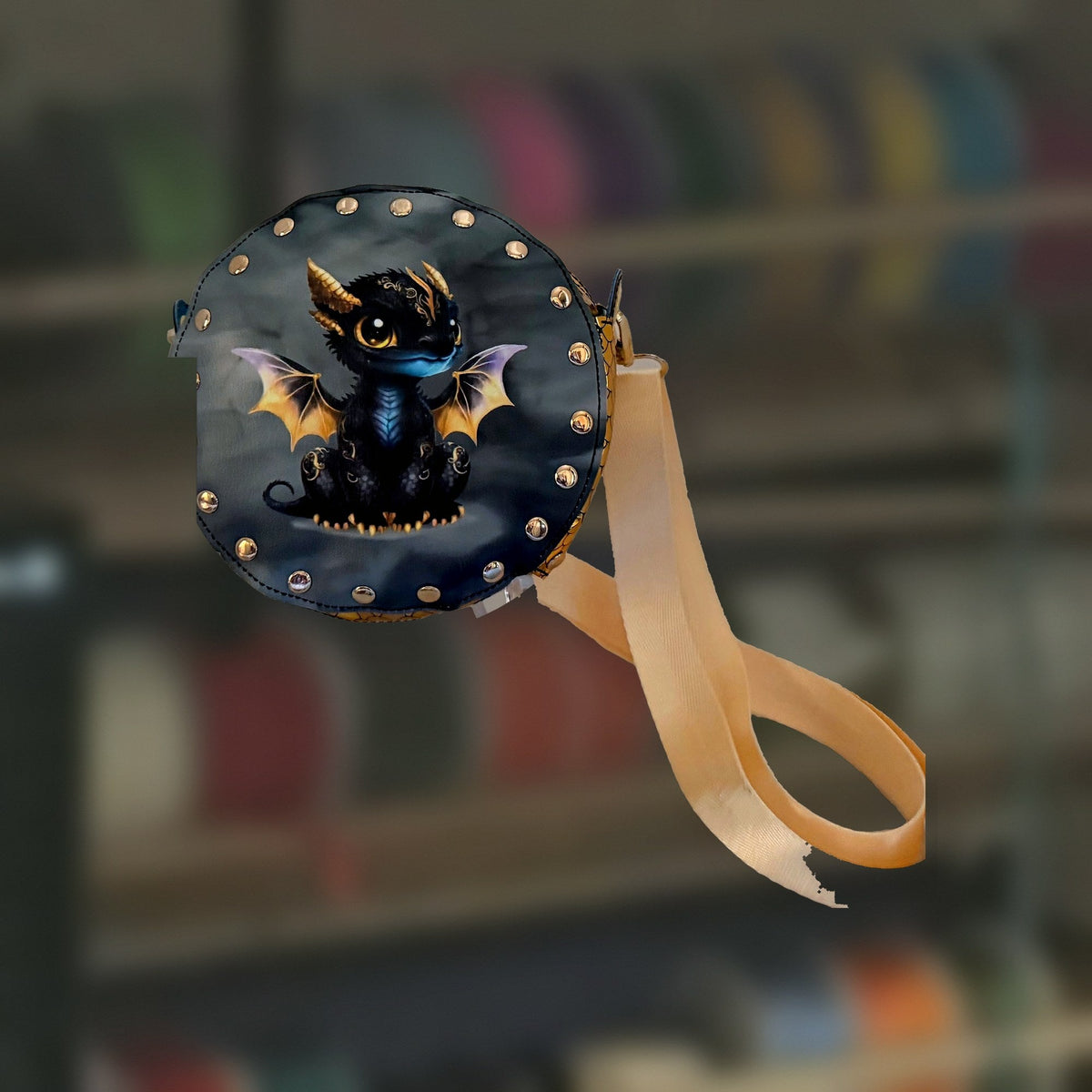 Baby Dragon Round Rivet Bag in black, handmade by Fabri-K-Tions in Louisville, KY