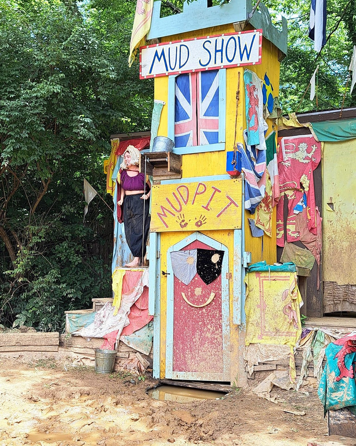 Colorful Mud Show stage at a Renaissance festival